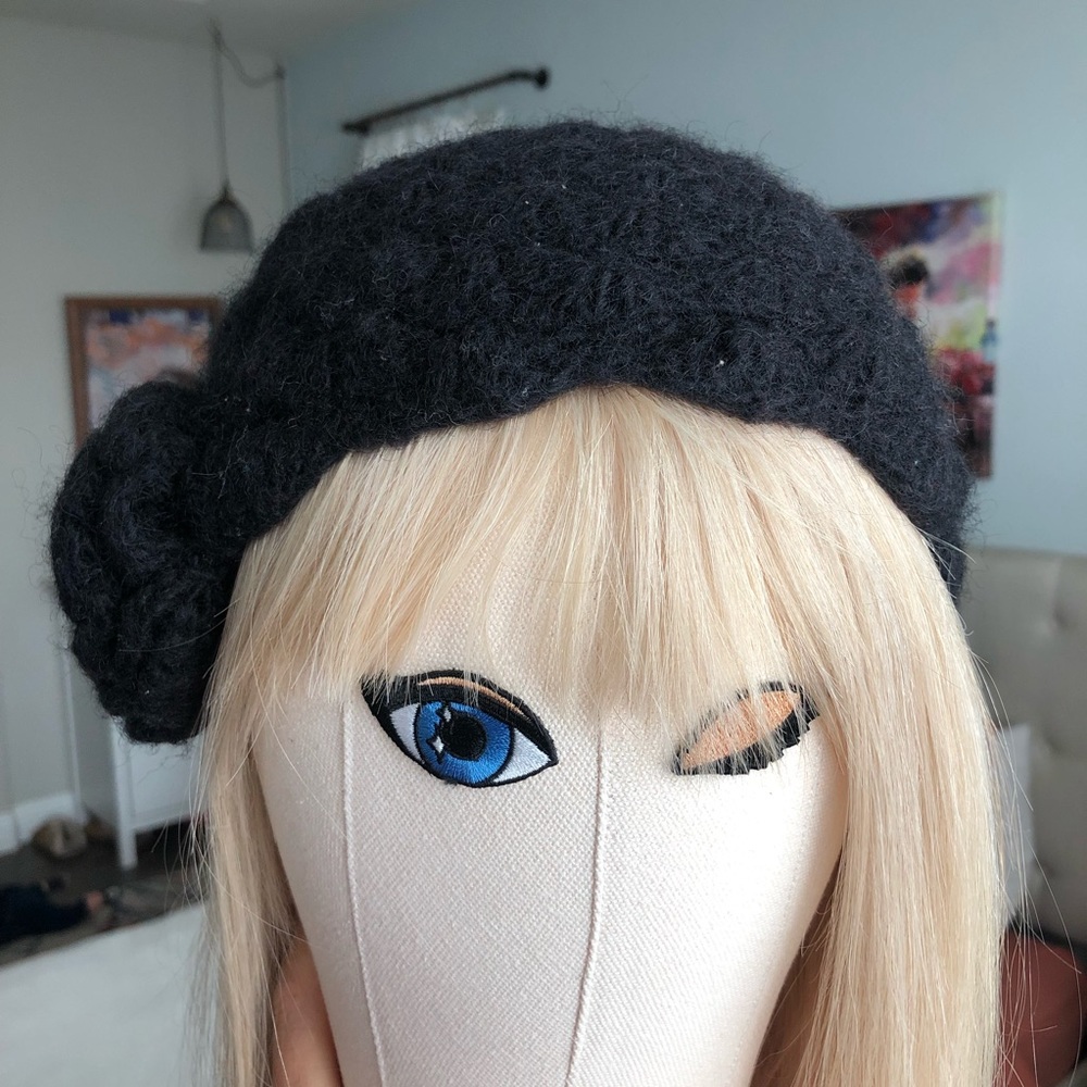 Wool flower accents fair trade knitted beanie hat